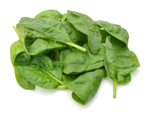 Fresh leaves of spinach on white background