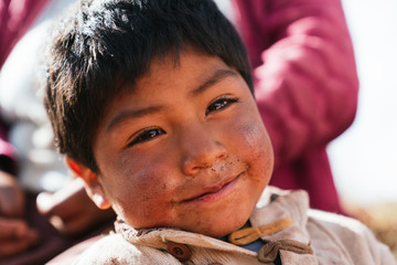 Hispanic kid in the andes mountain