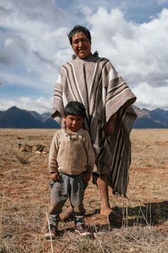 father and his son in peru