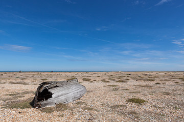 Upturned boat on Dungeness beach and one of the largest expanses of single in Europe.