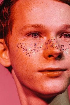Male model with glitter on face