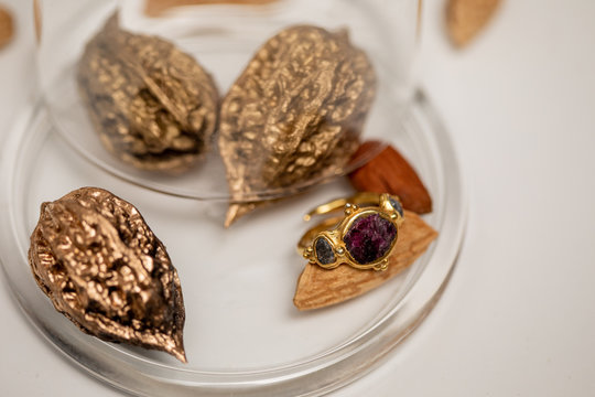 Elegant ring near golden nuts