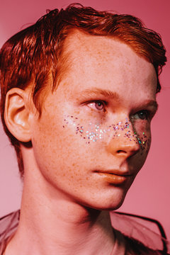 Male model with glitter on face