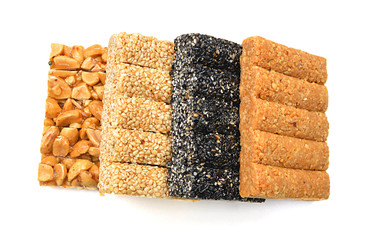 Honey bars with peanuts, sesame and sunflower seeds isolated