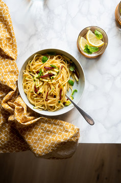 Spaghetti with zucchini and smoked ham