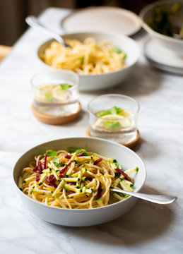 Spaghetti with zucchini and smoked ham