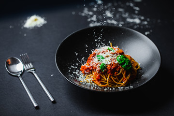 Pasta italian on black plate