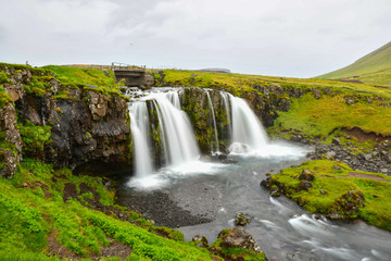 Fototapeta na wymiar Kirkjufellsfoss waterfall in Snaefellsnes peninsula in Iceland
