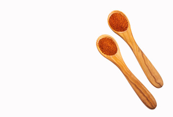 Capsicum annuum - Organic red paprika powder in two scoops