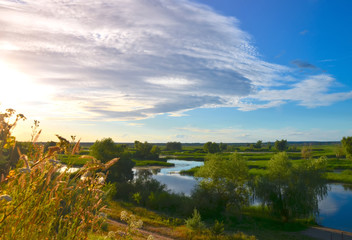Fototapeta premium Volga river Bank view from the mountain sunset with clouds