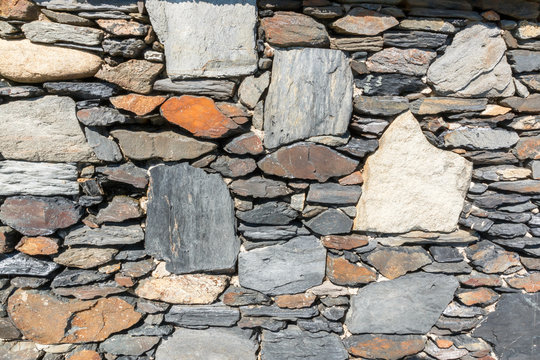Rubble stone wall to be used as background