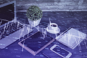 Double exposure of financial graph drawing and cell phone background. Concept of forex trading