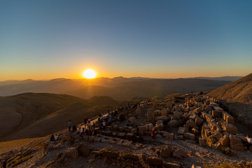 Statues on top of the Nemrut Mountain in Adiyaman, Turkey. To watch the sun set and rise.