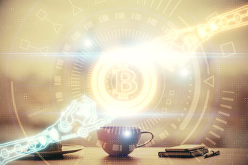 Double exposure of crypto currency theme drawing hologram over coffee cup background in office. Concept of international blockchain.