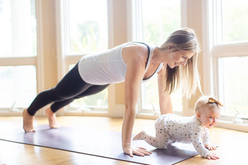 woman's fitness with baby at home