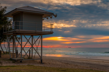 lifeguard tower at sunset