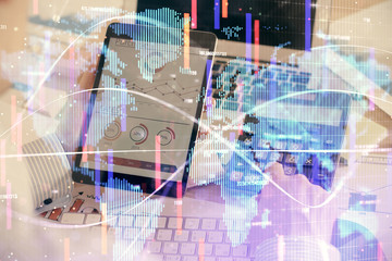 Double exposure of man's hands holding and using a phone and international business theme drawing.