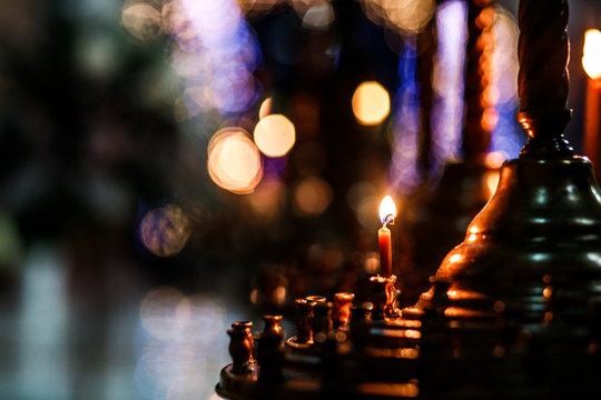 Holiday Candlelight Service Or Memorial Vigil. Red Candle In The Church. Cathedral, Christianity.