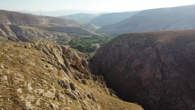 Karanlık Canyon, literally "Dark Canyon", is a deep steep-sided gorge located between the İli&ccedil; and Kemaliye districts of Erzincan Province, Turkey, formed by Karasu River on the Munzur Mountains.
