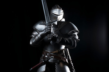 knight with sword blue velvet background