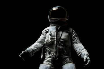 astronaut with black background - obrazy, fototapety, plakaty