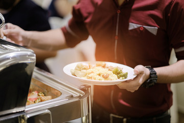 scooping the food, catering, dinner time
