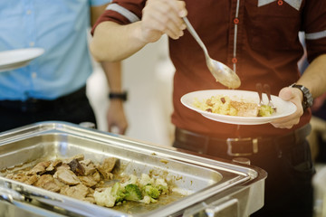 scooping the food, catering, dinner time
