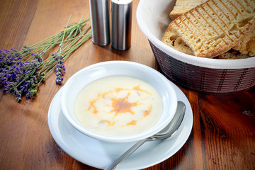 white soup with toasted bread ready to eat