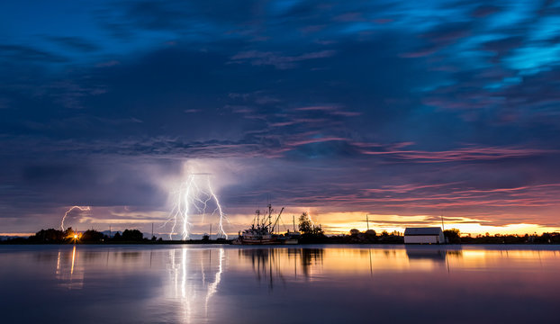 Lightning on the River With Boats