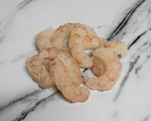 Seafood. Closeup of peeled raw shrimps ready for cooking.	