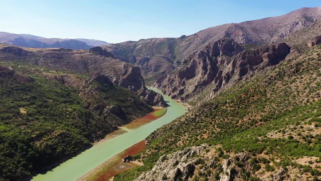 Karanlık Canyon, literally "Dark Canyon", is a deep steep-sided gorge located between the İli&ccedil; and Kemaliye districts of Erzincan Province, Turkey, formed by Karasu River on the Munzur Mountains.