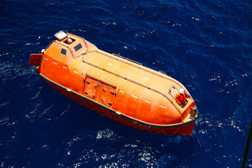 A lifeboat or life raft carried for emergency evacuation in the event of a disaster aboard a ship....