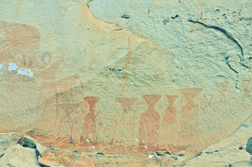 Ancient hematite painting on the wall of cliff in Thailand
