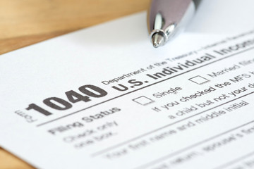 Formular 1040 Steuererklärung und ein Kugelschreiber