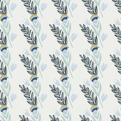 Fototapeta premium Seamless winter pattern with outline silhouettes of branches and flowers. Light blue background with contoured navy ornament.