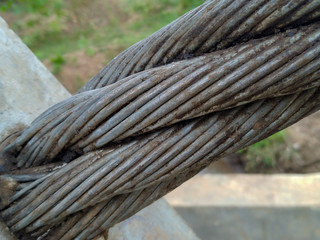 Fototapeta premium steel cables on the suspension bridge. close up