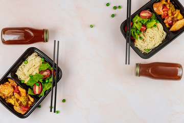 Food delivery or take away lunch in plastic container.