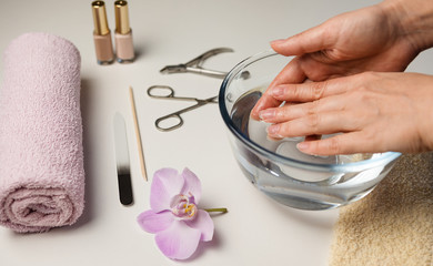 Hands of an adult woman 50+ close-up. Concept of Spa treatments and manicures, natural beauty.
