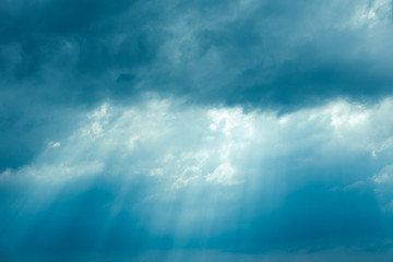 Sunrays Through Blue Rainy Dramatic Sky. Natural Abstract Background