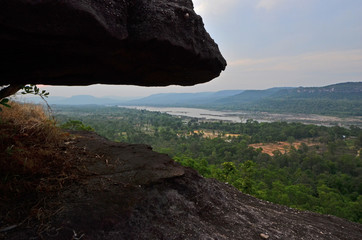 Green tropical forest and river in Asia from cliff view point