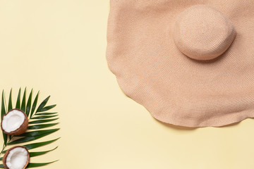 Straw hat on color background