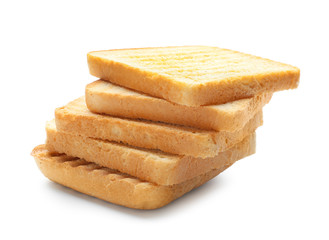 Slices of toasted bread on white background