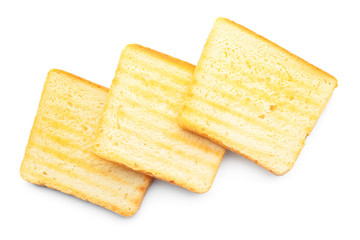 Slices of toasted bread on white background