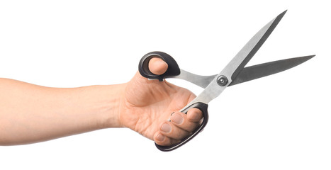 Male hand with tailor's scissors on white background