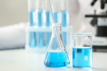 Glassware on table in laboratory