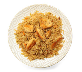Plate with tasty pilaf on white background
