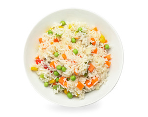 Plate with tasty pilaf on white background