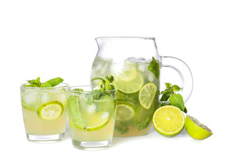Glassware of fresh mojito on white background