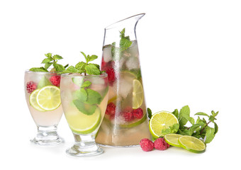 Glassware of fresh mojito on white background