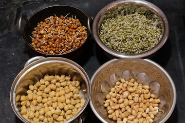 Fresh and healthy sprouts isolated on black background